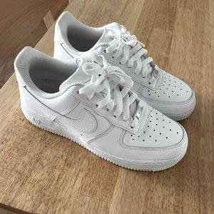 Men’s white Nike Air Force 1s